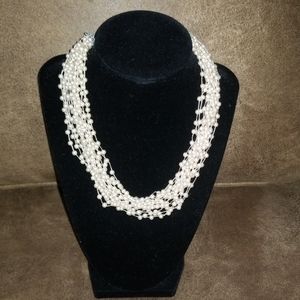 Elegant Multi strand pearl choker.